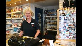 Photo of woman in the in RNLI gift shop