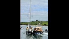 Courtmacsherry RNLI rescues two sailors - lifeboat and vessel pictured