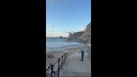 helicopter over beach