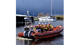 Archive Photograph Lough Derg RNLI Lifeboat Jean Spier with 4 crew on board, view from starboard side as lifeboat heads out on a Shout