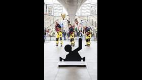 Tower RNLI crew demonstrating a throw bag at the Cutty Sark