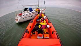 The Whitstable lifeboat alongside the yacht that went aground off Sheppey on Sunday morning.