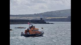 The all-weather Trent class lifeboat Blue Peter VII launching on service.