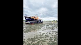Michael O'Brien being recovered after rescue