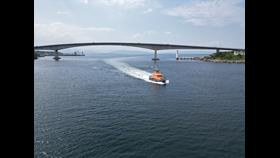 Portree lifeboat sailing under the Skye Bridge