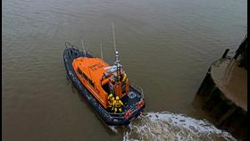 Shannon-class lifeboat 10-04 Storm Rider leaving Fleetwood Lifeboat Station's Pen