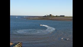 Barrow Inshore Lifeboat with Piel Island in the Background