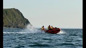 Borth RNLI having just launched and headed towards Ynyslas beach. Photo taken from the water
