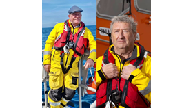 Split Picture of Coxswains Mark Gannon and Eugene Kehoe wearing the Yellow RNLI gear posing for the photo