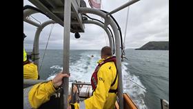 The view from the all-weather lifeboat as it provided shelter to the inshore lifeboat on their return to the lifeboat station.