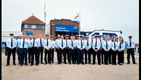 Stonehaven volunteer lifeboat crew lined up in front of the new station building