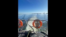 RNLI Invergordon with Trawler in tow