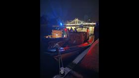 Tower & Chiswick RNLI moored up on scene.