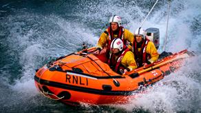 Port Isaac crew in their D class lifeboat in rough seas.