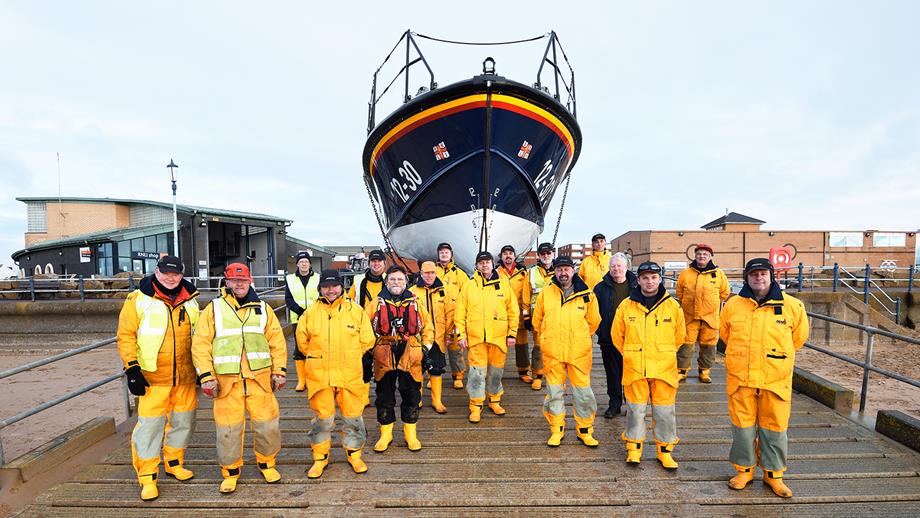 RNLI crew at Lytham St Annes with the Mersey class lifeboat Her Majesty the Queen