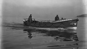 Black and white image of Wells lifeboat, Royal Silver Jubilee 1910-1935, while on trials