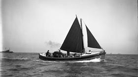 Black and white image of Port Patrick lifeboat, J. and W., while on trials