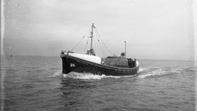 Black and white image of Hastings lifeboat, M.T.C., while on trials