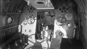 Black and white image of interior of Aberystwyth lifeboat, Frederick Angus