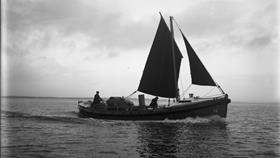 Black and white image of Moelfre lifeboat, G.W., while on trials