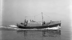 Black and white image of Reserve lifeboat (Tenby), James and Catherine MacFarlane, while on trials
