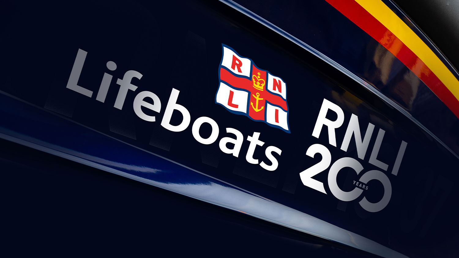 Image of RNLI Lifeboats and RNLI 200 logo on side of lifeboat