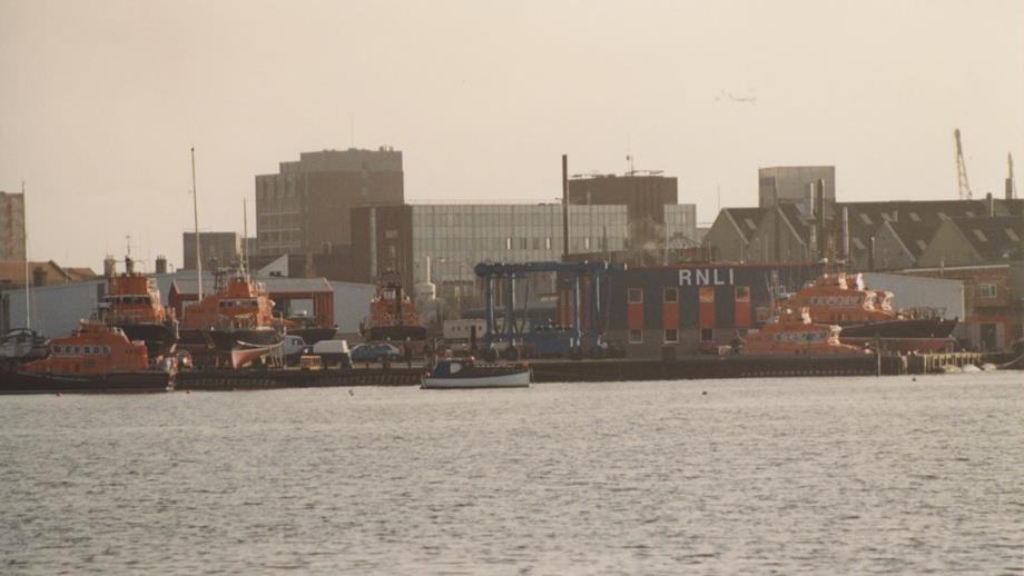 Colour image of Trent and Severn lifeboats moored at Poole Depot