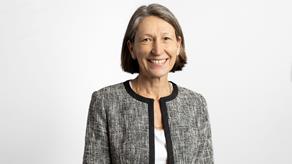 Headshot of a woman wearing a suit