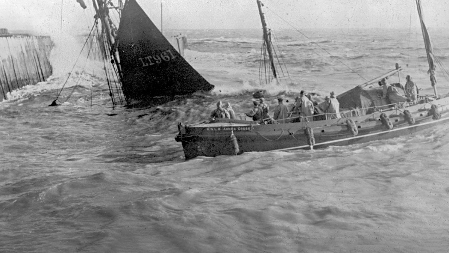 Wooden lifeboat attempts to rescue the crew of a sinking ketch