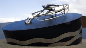 RNLI Memorial sculpture, depicting a person in a boat saving another from the water