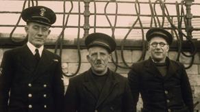 Margate Coxswain Edward Parker with his sons James (left) and Edward. They are smiling at the camera. All three took part in the evacuation of Dunkirk in May 1940. Photo: A C Robinson