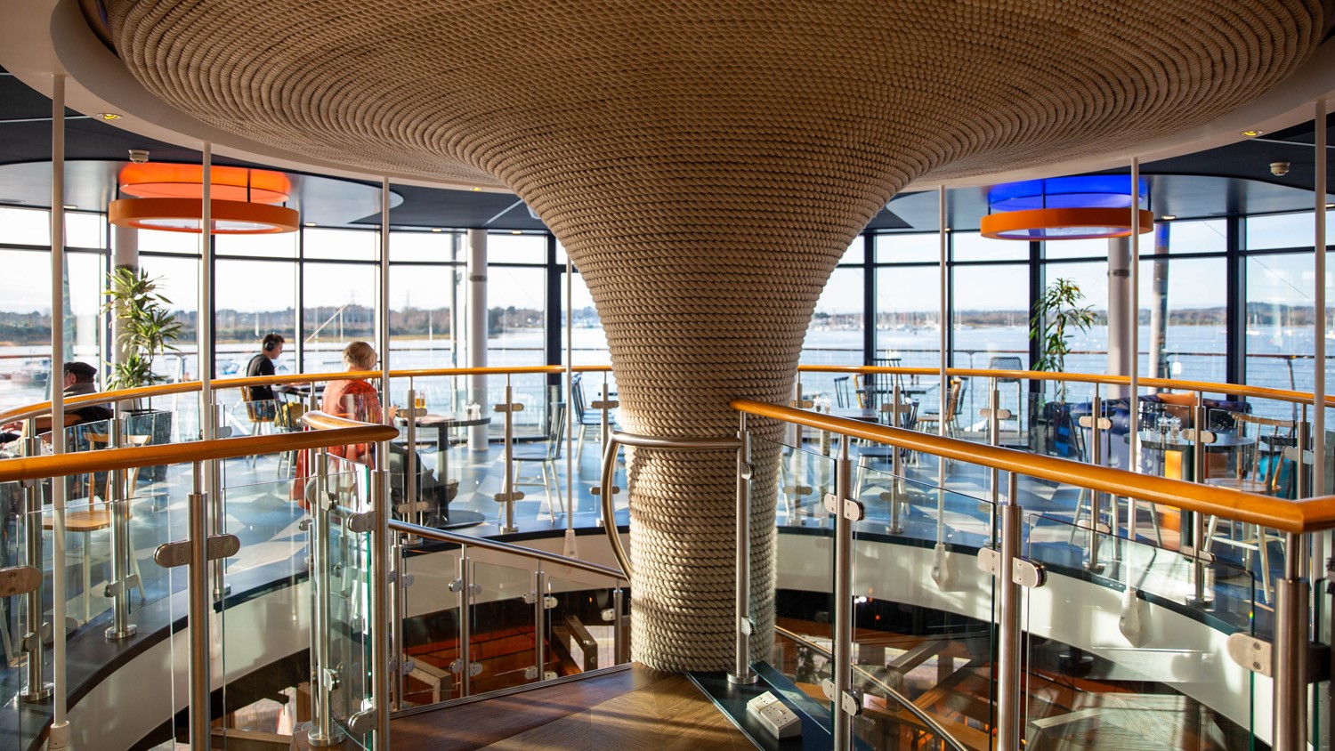 A sleek glass railing providing a modern and elegant barrier, enhancing the aesthetic of the surrounding space.
