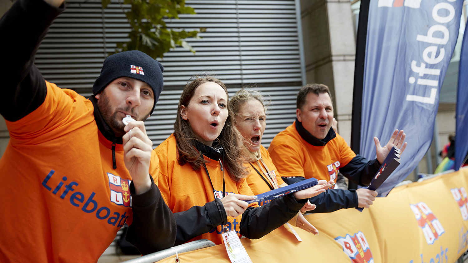 The RNLI Cheer Team shout encouragement at the marathon runners