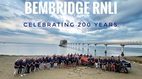 Wide angle shot of Bembridge station crew celebrating the RNLI's 200th birthday