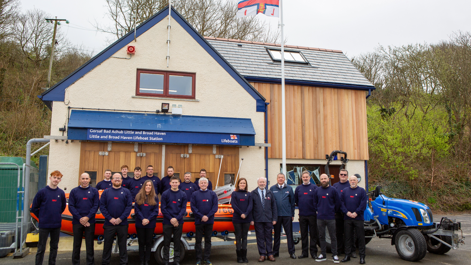 Group photo of Little and Broadhaven crew stood in front of their newly renovated station.