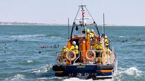 Mass simulation event testing of self rescue equipment during a mass rescue in response to the rescue of migrants crossing the English Channel. RNLI lifeguards acted as casualties and were rescued by volunteer crew members by a Shannon class lifeboat.