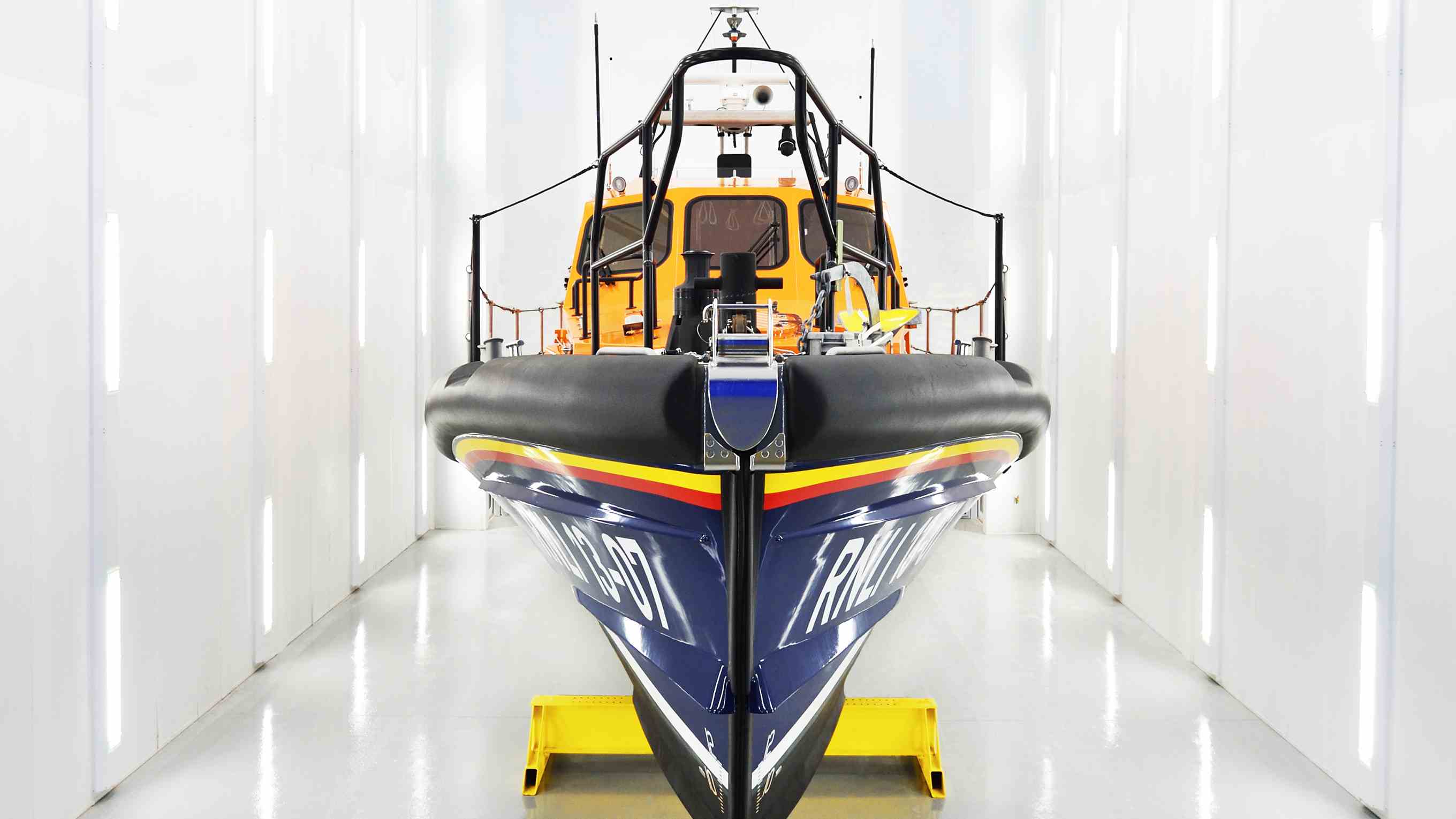 A completed Shannon class lifeboat inside the All-weather Lifeboat Centre’s spray booth