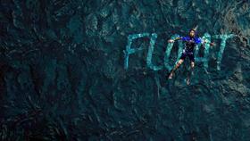 A man is floating in water with the word ‘float’ written behind him.