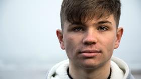 Portrait of Evan Chrisp, who was able to save his own life because he learned to float