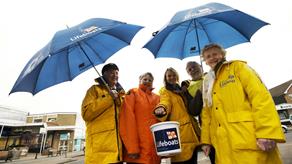 Come rain or shine, RNLI fundraising volunteers always have a smile on their face!