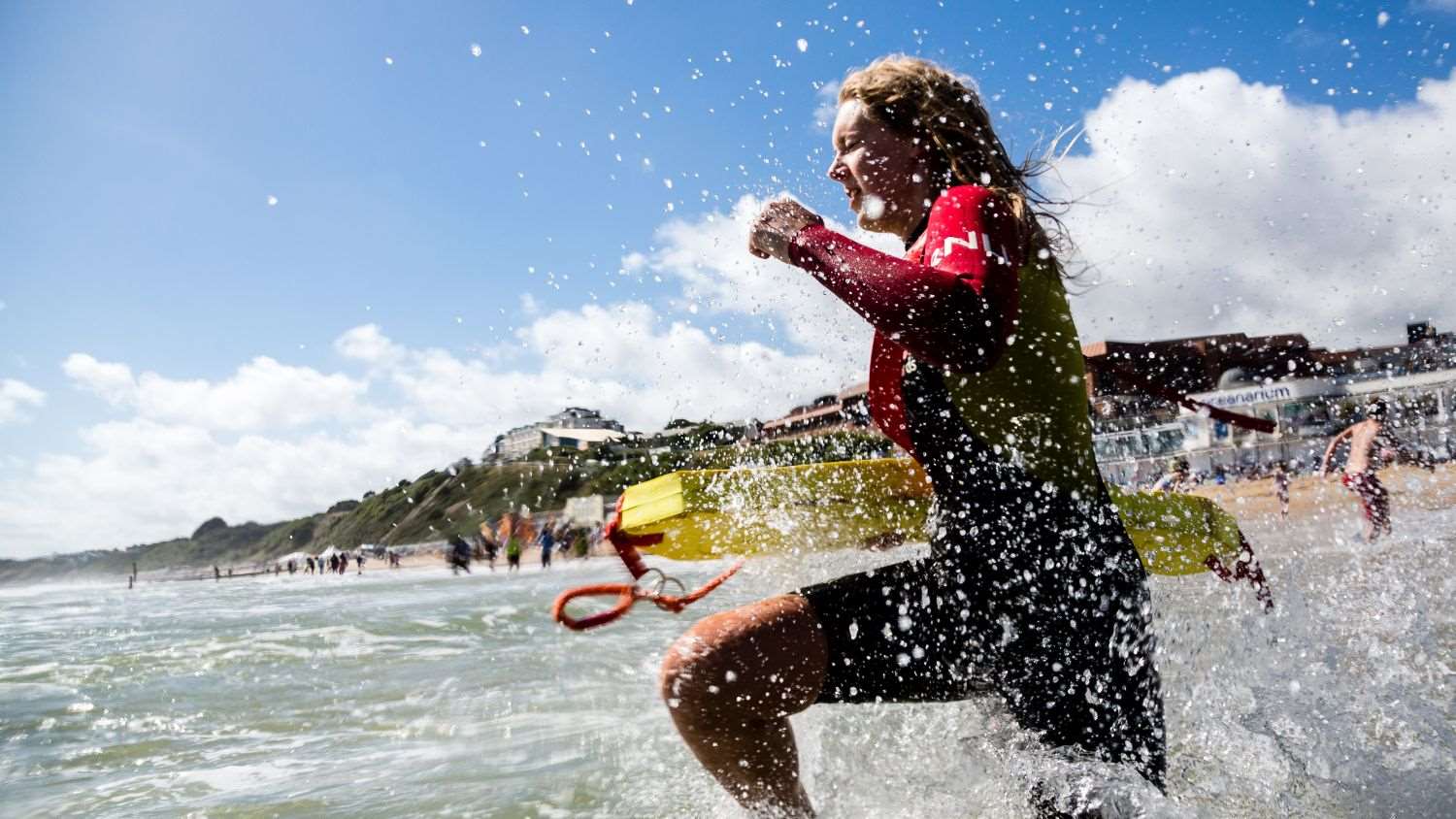 Lifeguard running into the sea