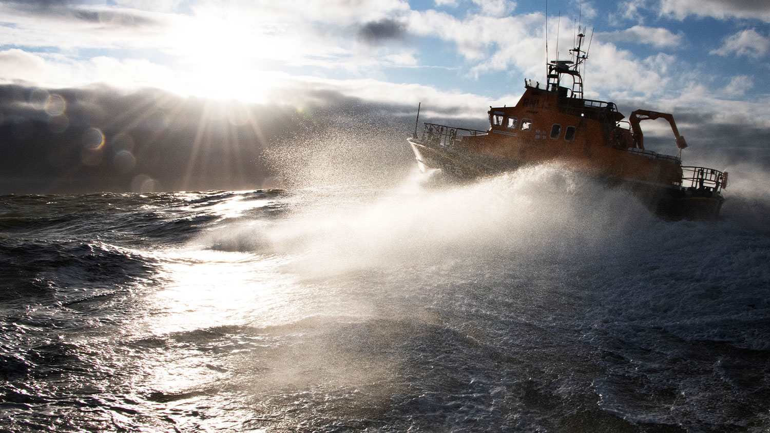 RNLI Severn Lifeboat with white horses blue skies and sunny weather
