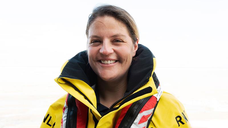 Emily Jones crew member smiling at the camera