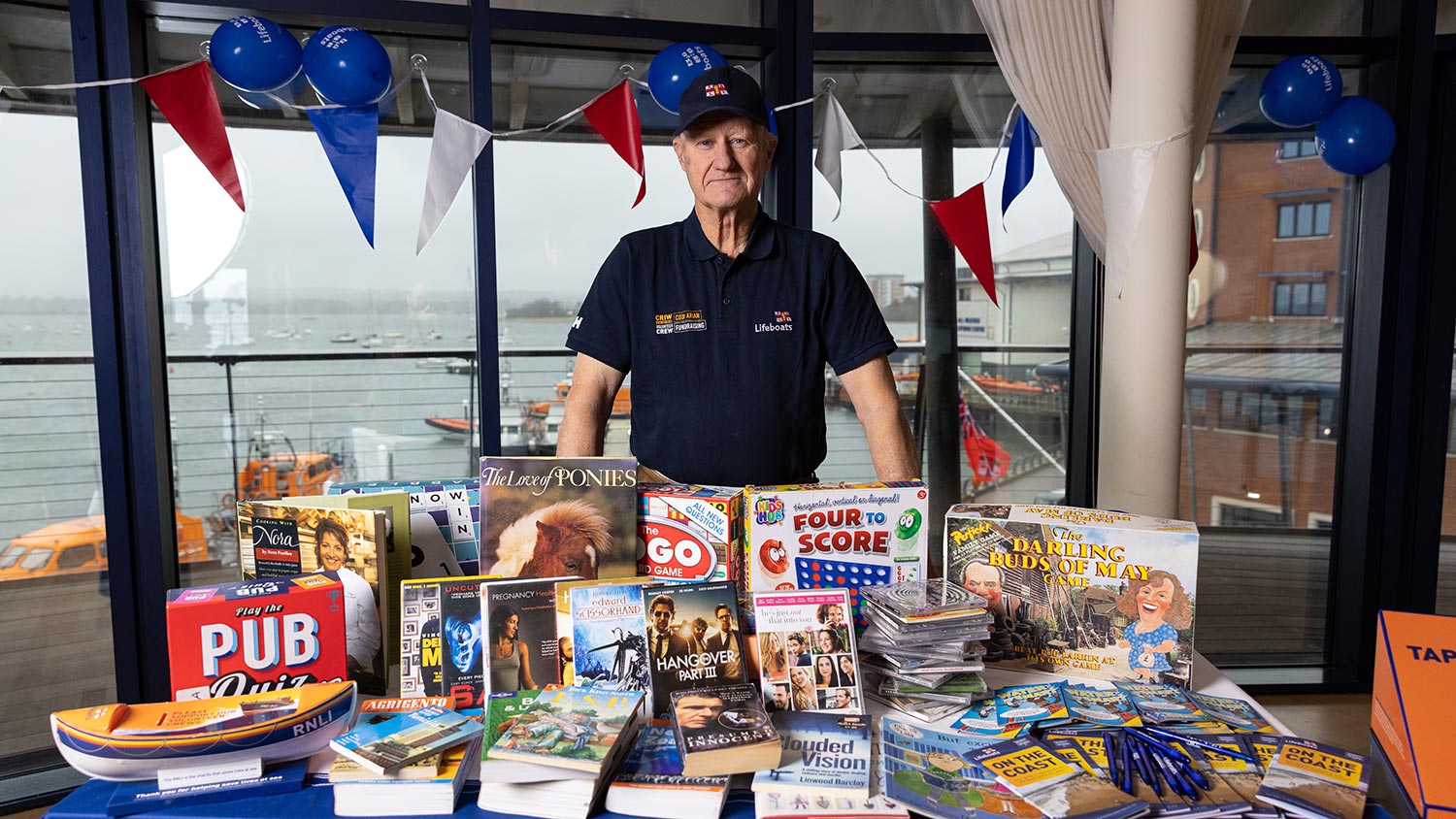 A fundraiser selling books and games