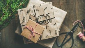 A pile of gifts wrapped in brown paper