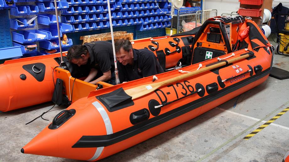 Installing electrics on a D class Atlantic lifeboat at the Inshore Lifeboat Centre