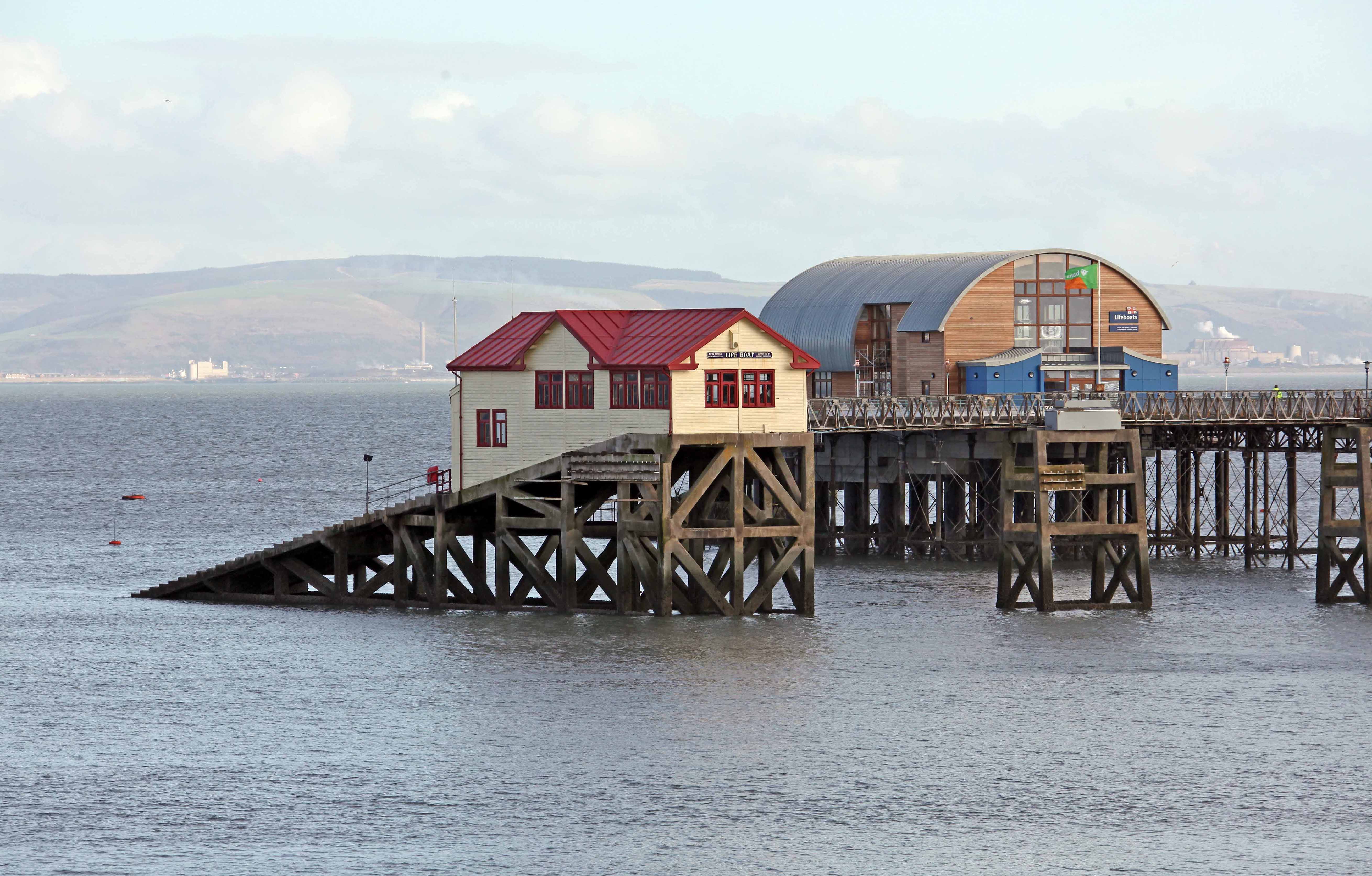 The Mumbles RNLI’s new Tamar class lifeboat station alongside the former lifeboat station