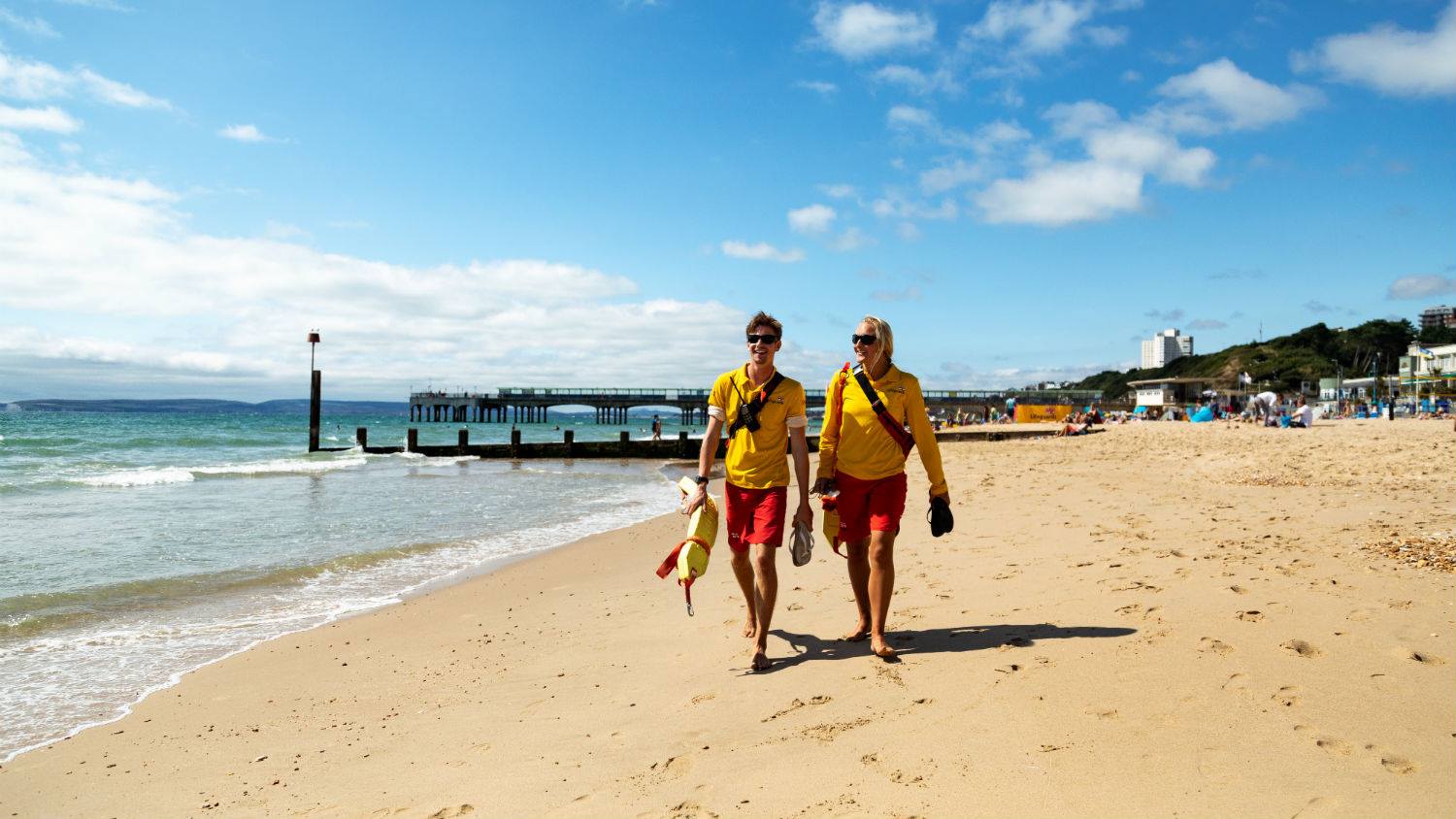 Two lifeguards patrolling the beach