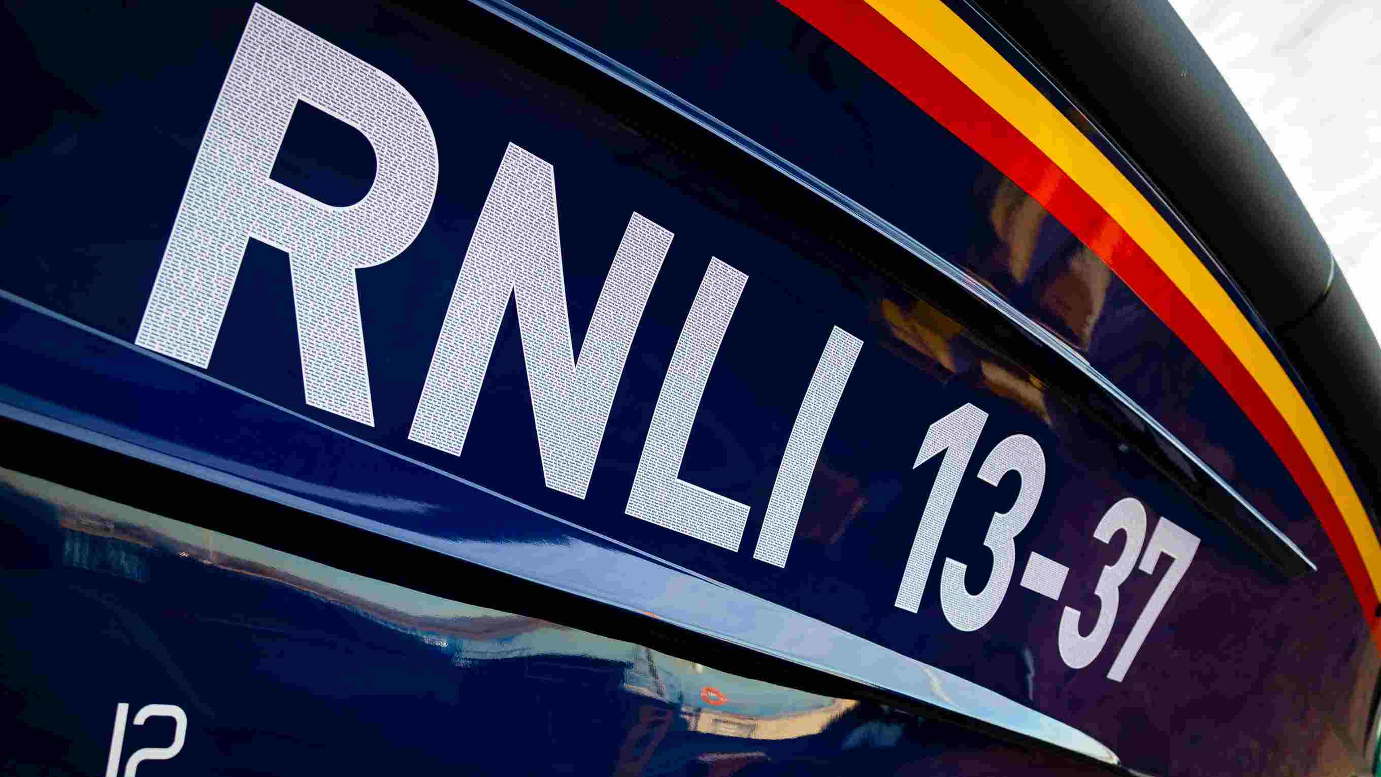 Image of the letters and numbers on the side of a Launch A Memory lifeboat